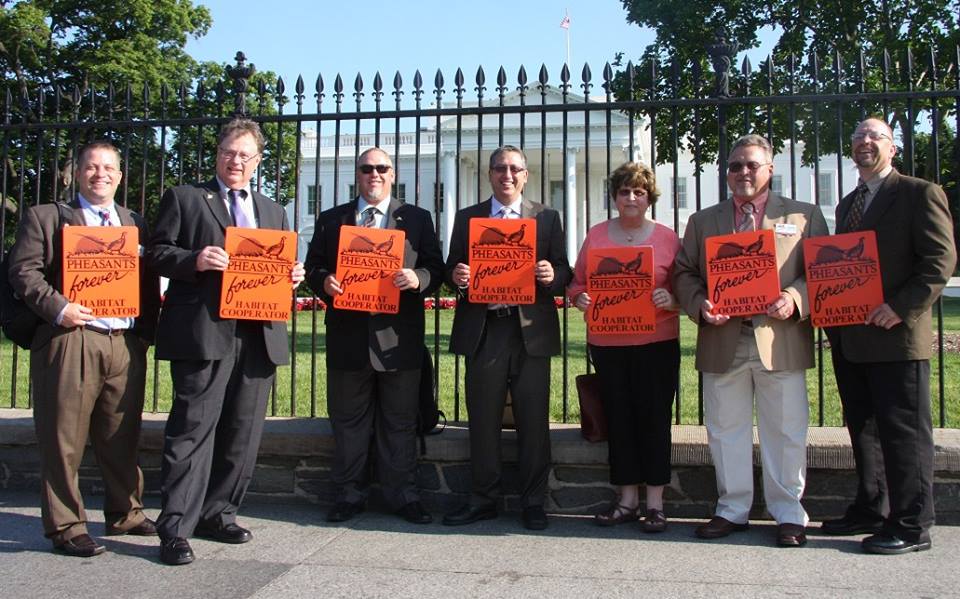 Group photo in front of white house