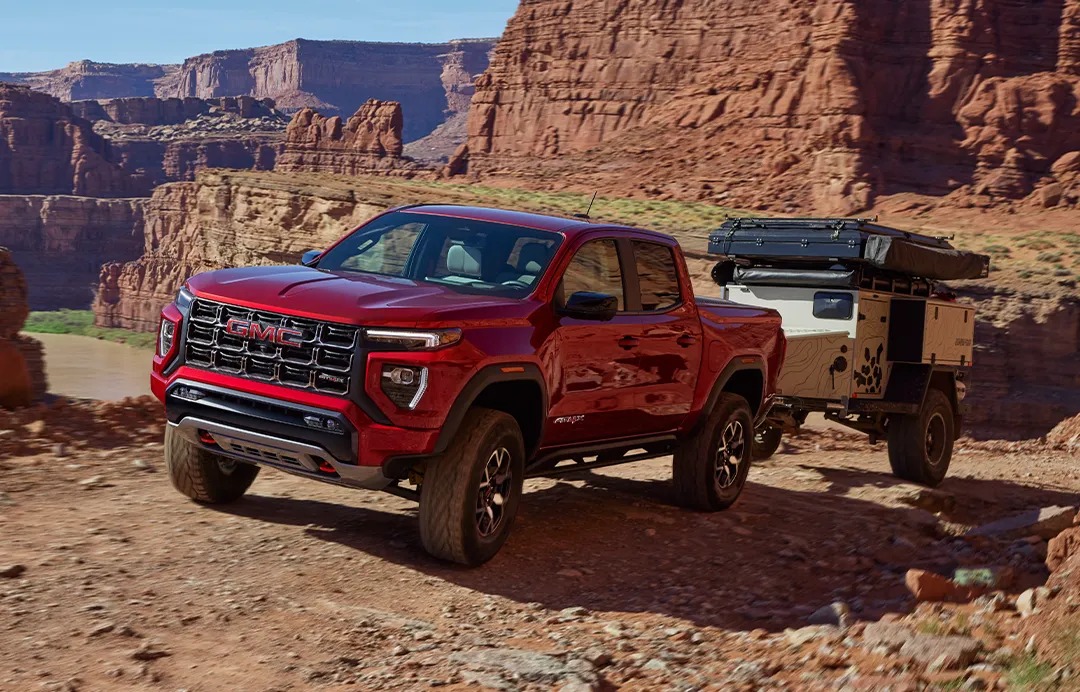 GMC Truck towing a trailer